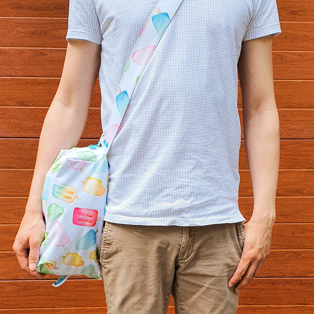 popsicle iceblock water resistant bag worn by man