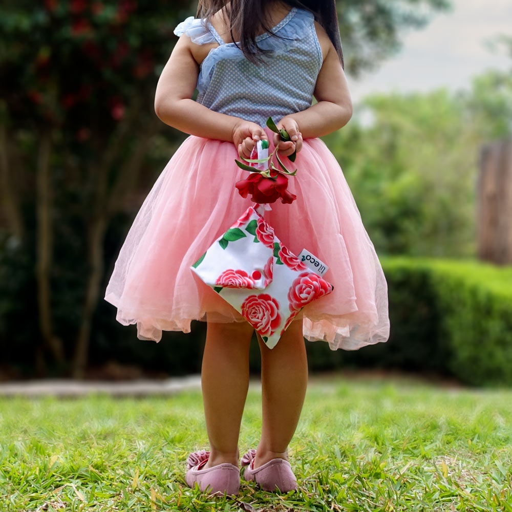 Water resistant Camellia small bag held by girl