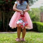 Load image into Gallery viewer, Water resistant Camellia small bag held by girl
